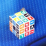 Брелок "Кубик Рубика" с символами, белый